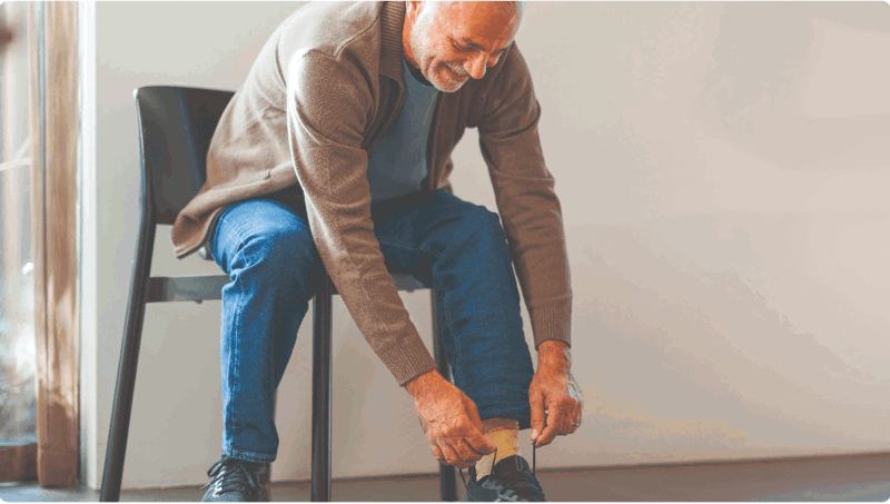 Man tying his shoes